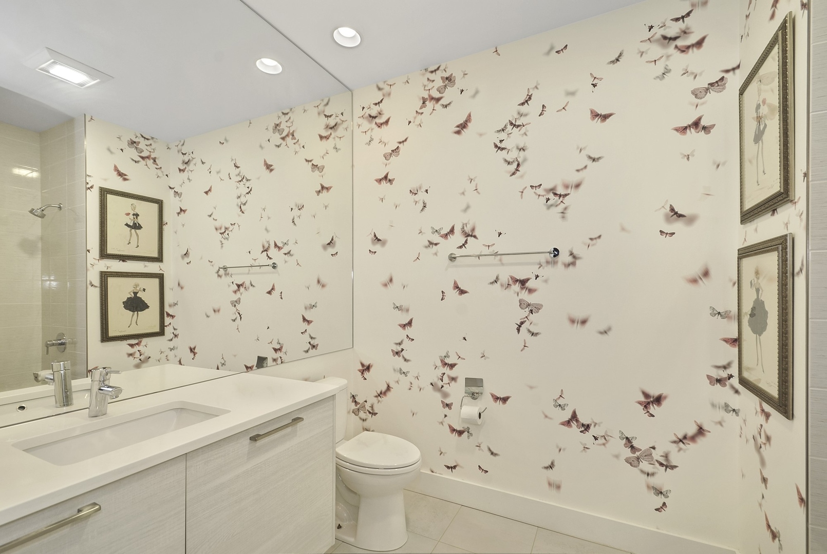 1124 West Adams Street, Unit PHW Chicago, IL 60607 - Photo 48 of 55 a bathroom with a shower curtain sink and a toilet