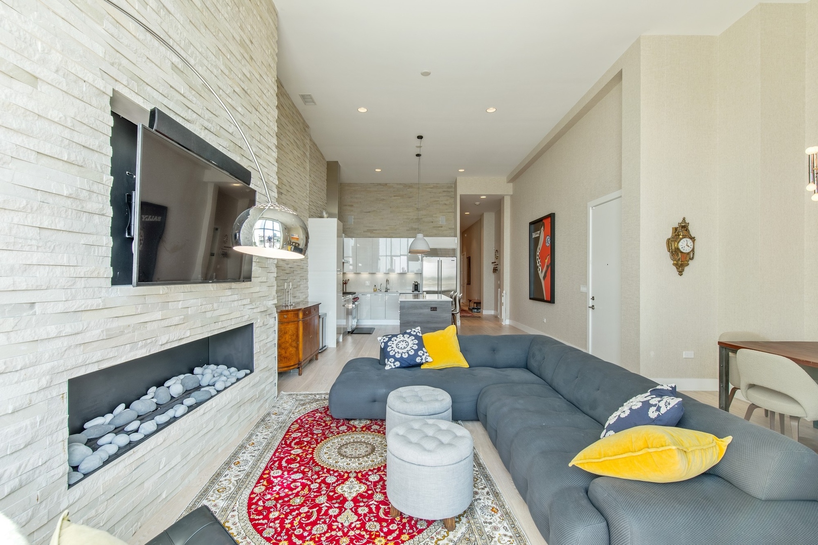 1124 West Adams Street, Unit PHW Chicago, IL 60607 - Photo 9 of 55 a living room with furniture and a fireplace