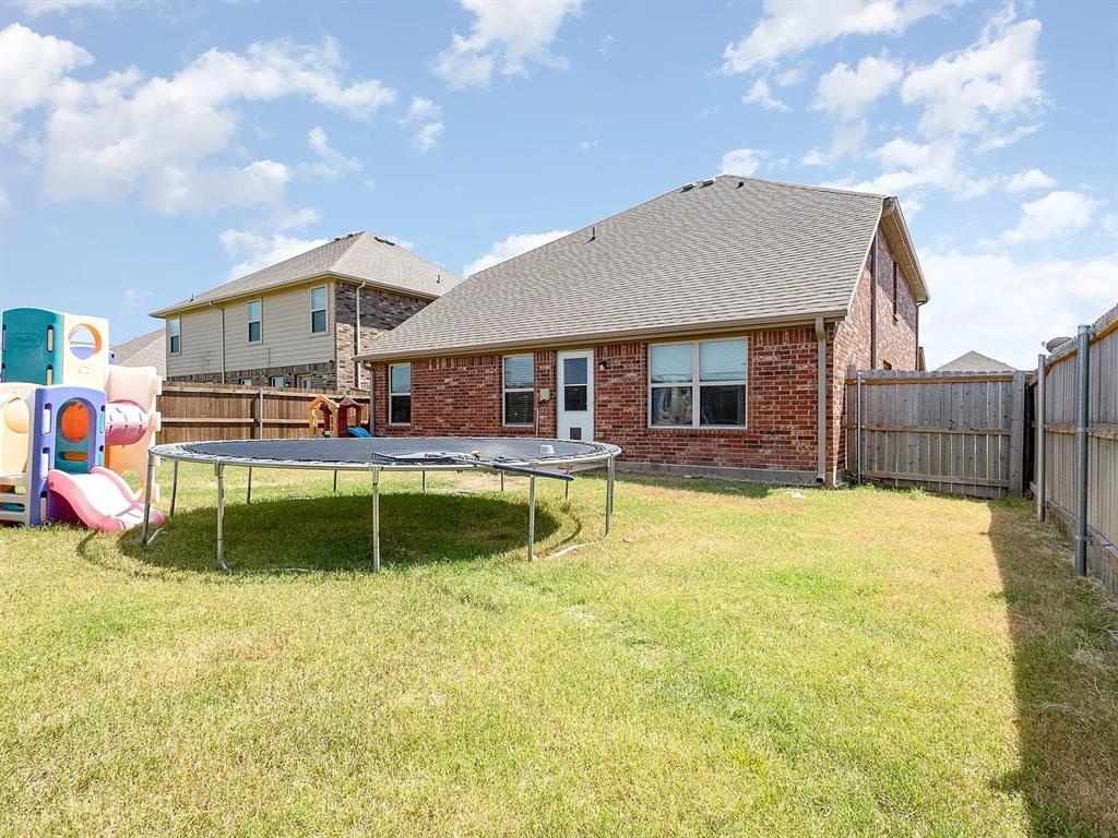 2320 Willard Way Forney, TX 75126 - Photo 25 of 26 a swimming pool with table and chairs
