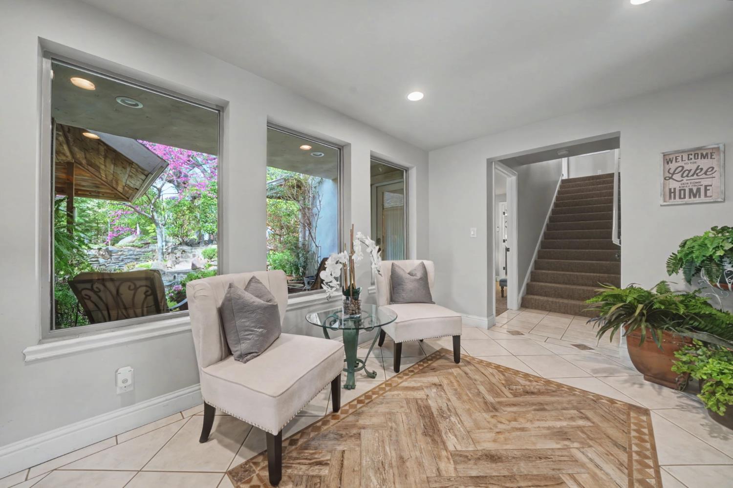450 Lakeview Road Copperopolis, CA 95228 - Photo 20 of 93 a living room with furniture and a potted plant