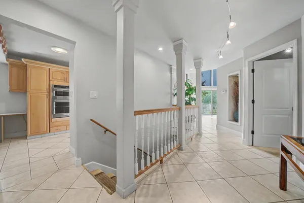 a view of entryway with wooden floor