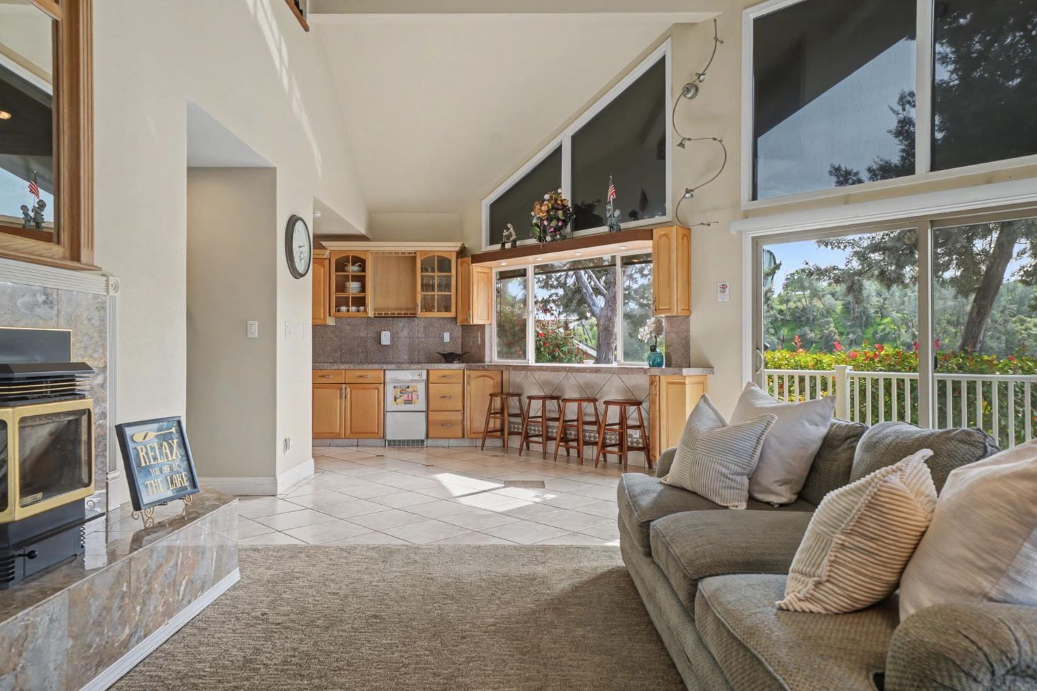 450 Lakeview Road Copperopolis, CA 95228 - Photo 34 of 93 a living room with furniture and a flat screen tv