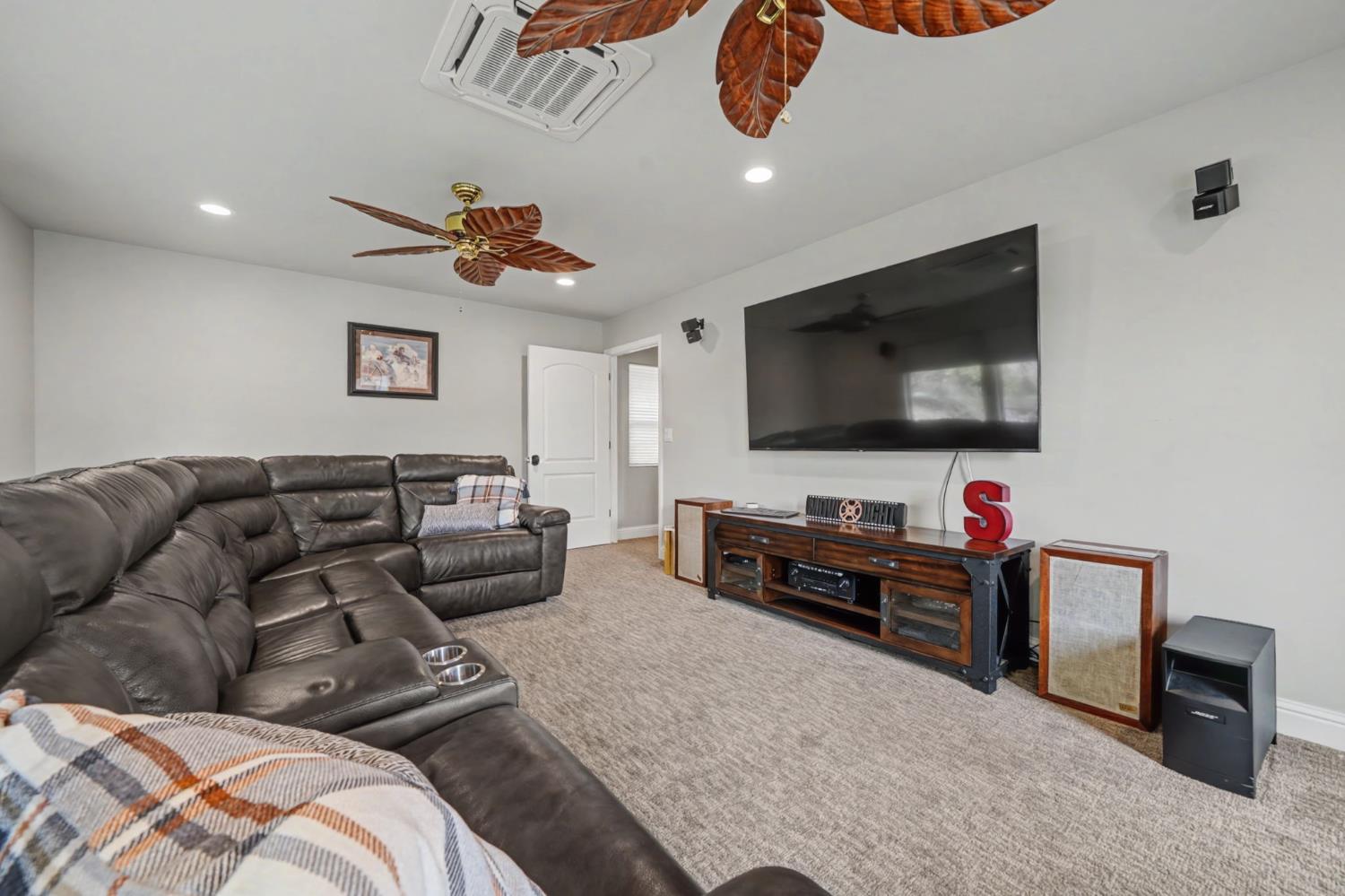 450 Lakeview Road Copperopolis, CA 95228 - Photo 50 of 93 a living room with furniture and a flat screen tv
