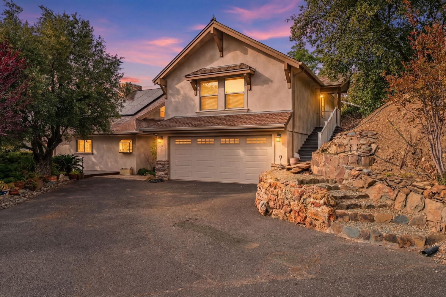 450 Lakeview Road Copperopolis, CA 95228 - Photo 5 of 93 a front view of a house with a garage