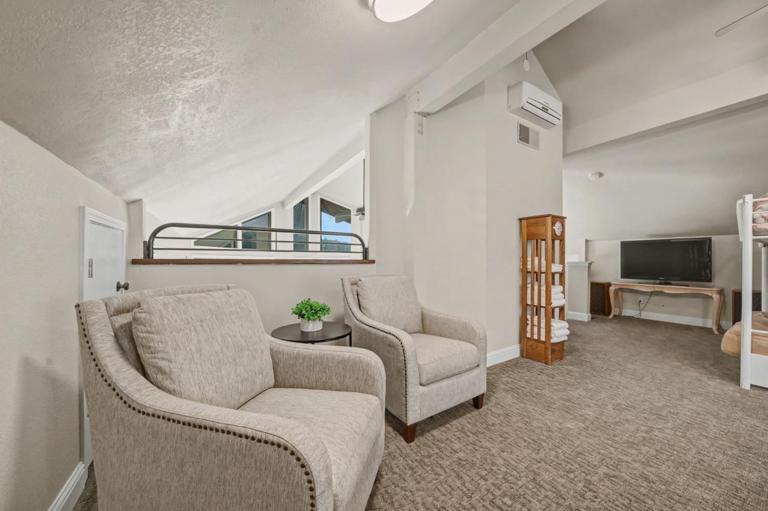 450 Lakeview Road Copperopolis, CA 95228 - Photo 66 of 93 a living room with furniture and a flat screen tv