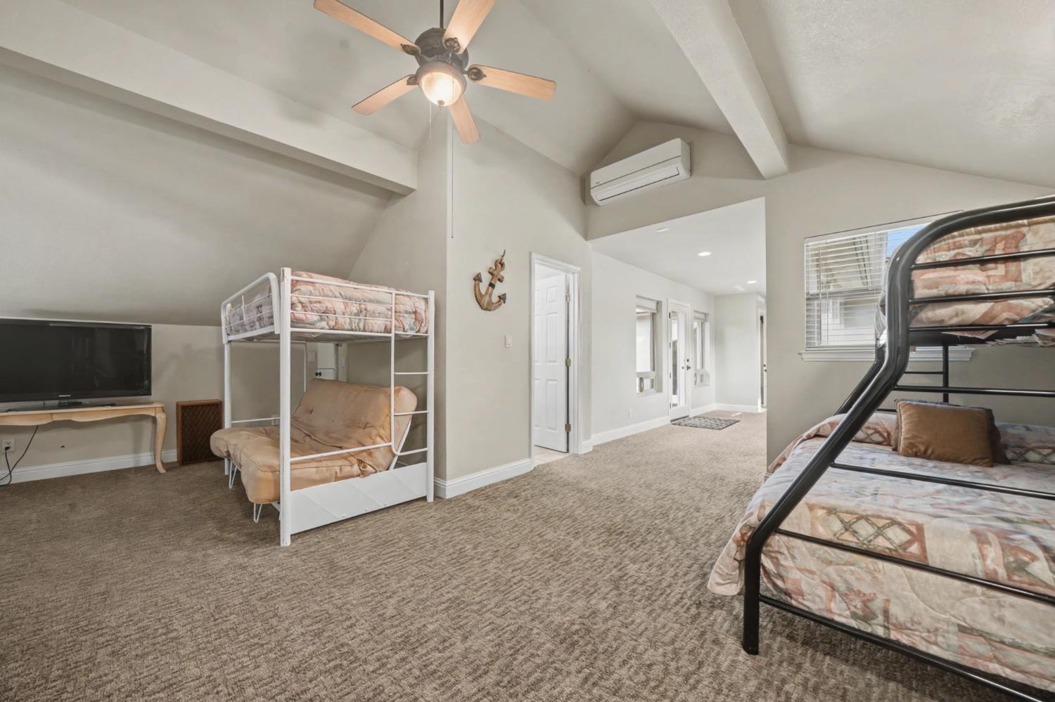 450 Lakeview Road Copperopolis, CA 95228 - Photo 67 of 93 a living room with furniture and a flat screen tv