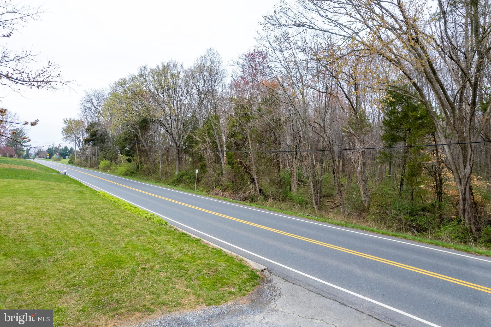 19601 Darnestown Road Beallsville, MD 20839 - Photo 103 of 119 a view of a bathtub in a yard next to a yard