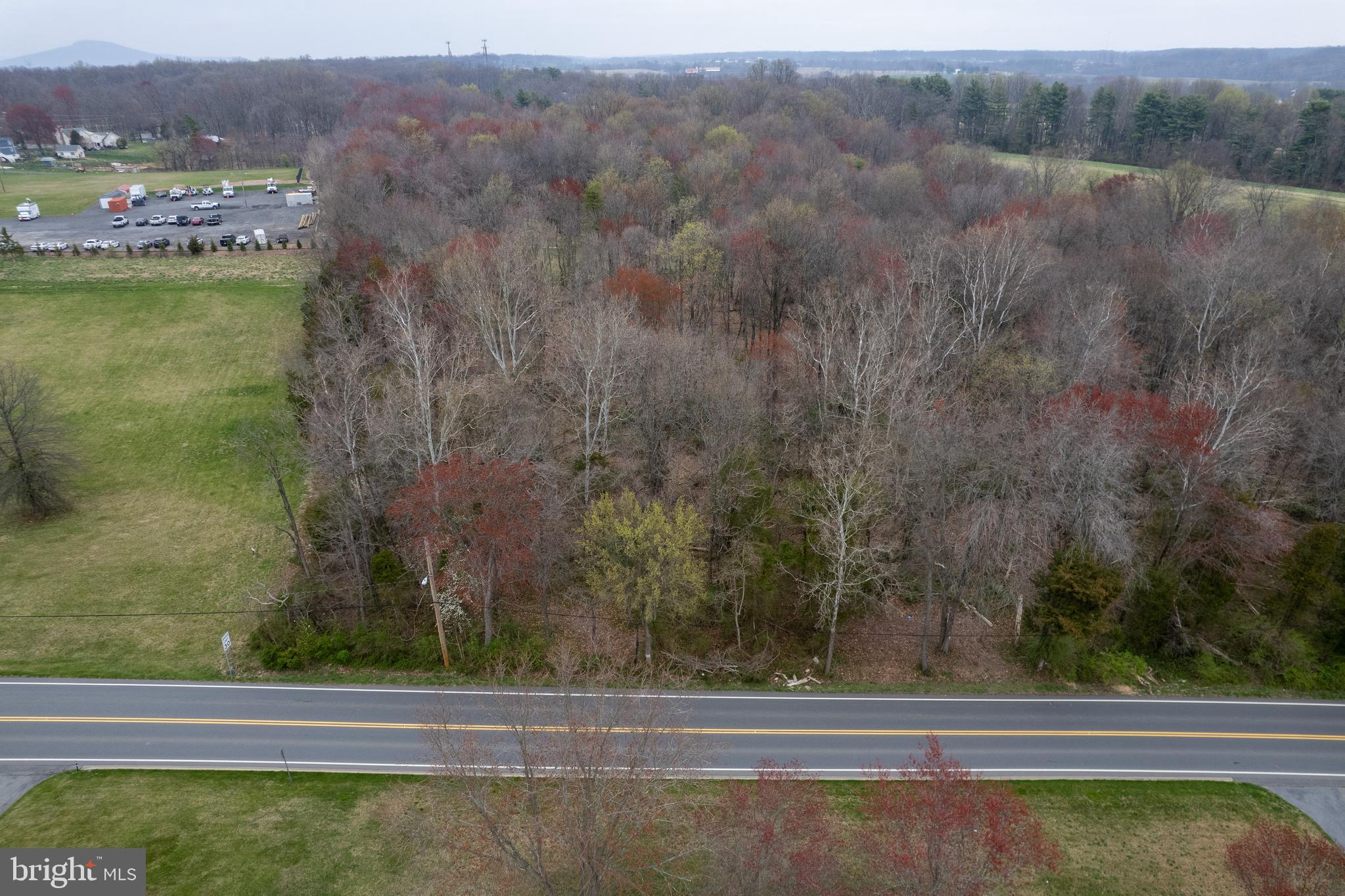 19601 Darnestown Road Beallsville, MD 20839 - Photo 114 of 119 a view of a floor to ceiling window and a yard
