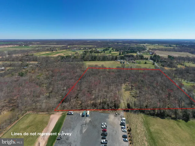 an aerial view of residential house with outdoor space