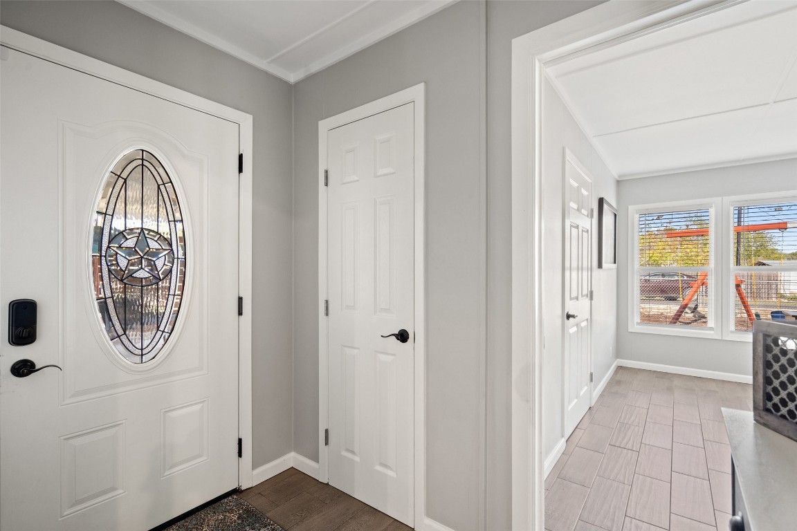 35 Presidio Road Wimberley, TX 78676 - Photo 11 of 39 a view of front door with wooden floor