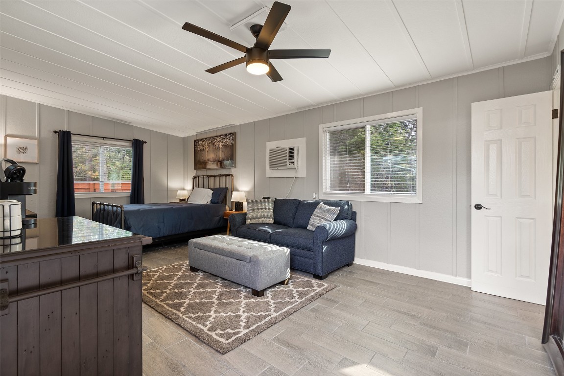 35 Presidio Road Wimberley, TX 78676 - Photo 33 of 39 a living room with furniture and a window