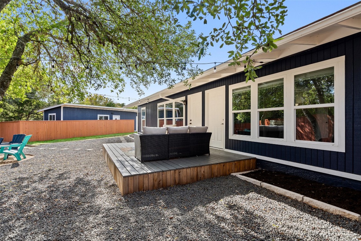 35 Presidio Road Wimberley, TX 78676 - Photo 4 of 39 a front view of a house with a yard