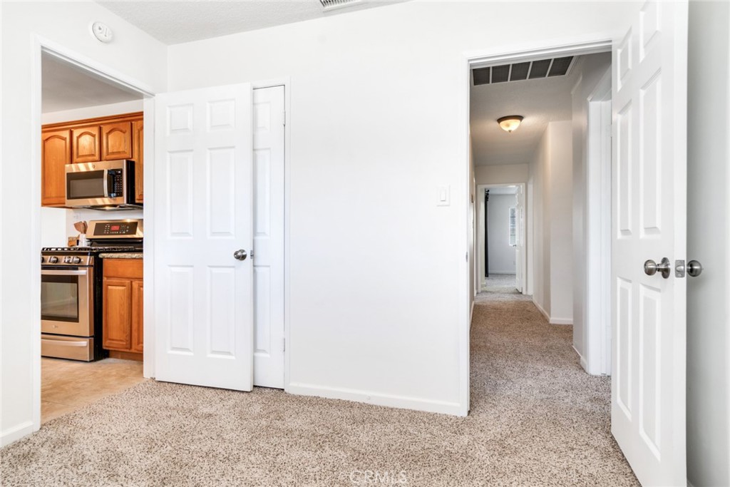 8955 Holly Lane Riverside, CA 92503 - Photo 13 of 32 a view of a kitchen from an empty room