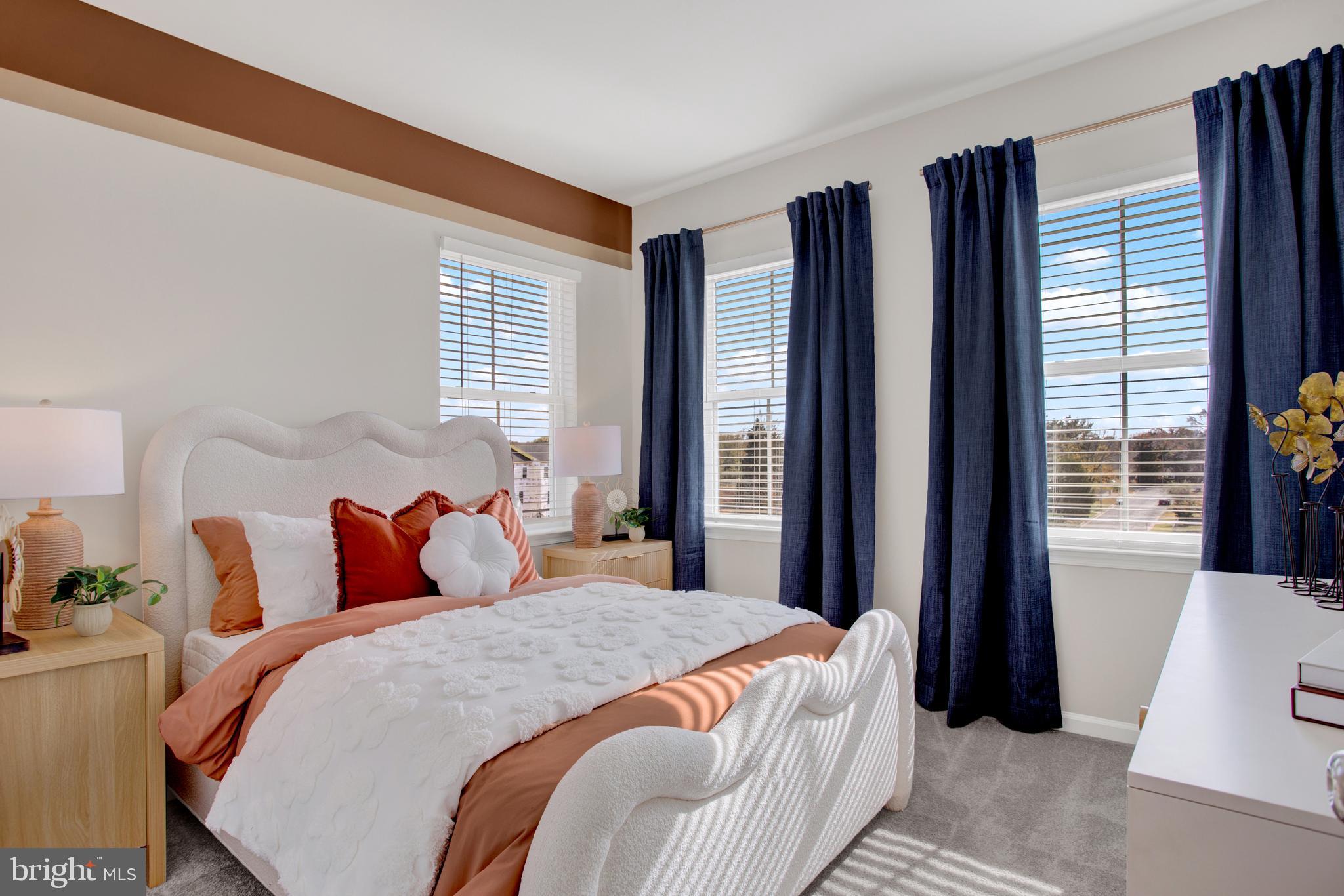 1006 Swallowtail Lane Manassas, VA 20110 - Photo 21 of 65 a bedroom with bed and large windows