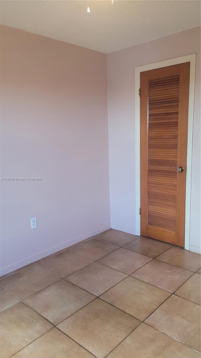 1793 Southwest 5th Street, Unit 401 Miami, FL 33135 - Photo 6 of 12 a view of an empty room