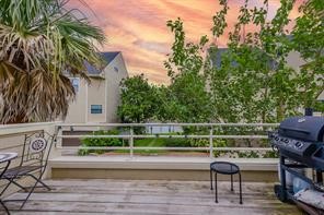 896 Davis Road League City, TX 77573 - Photo 13 of 46 a view of a chair and tables in the patio