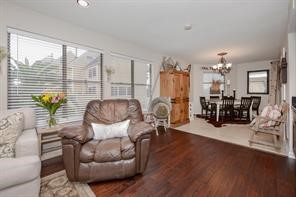 896 Davis Road League City, TX 77573 - Photo 19 of 46 a living room with furniture and wooden floor
