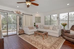 896 Davis Road League City, TX 77573 - Photo 2 of 46 a living room with furniture and a large window