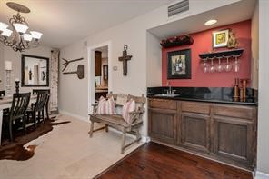 896 Davis Road League City, TX 77573 - Photo 22 of 46 a spacious bathroom with a double vanity sink and a mirror