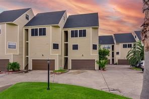 896 Davis Road League City, TX 77573 - Photo 4 of 46 a front view of a house with a garden and plants