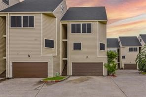 896 Davis Road League City, TX 77573 - Photo 5 of 46 a front view of a house with a yard and garage