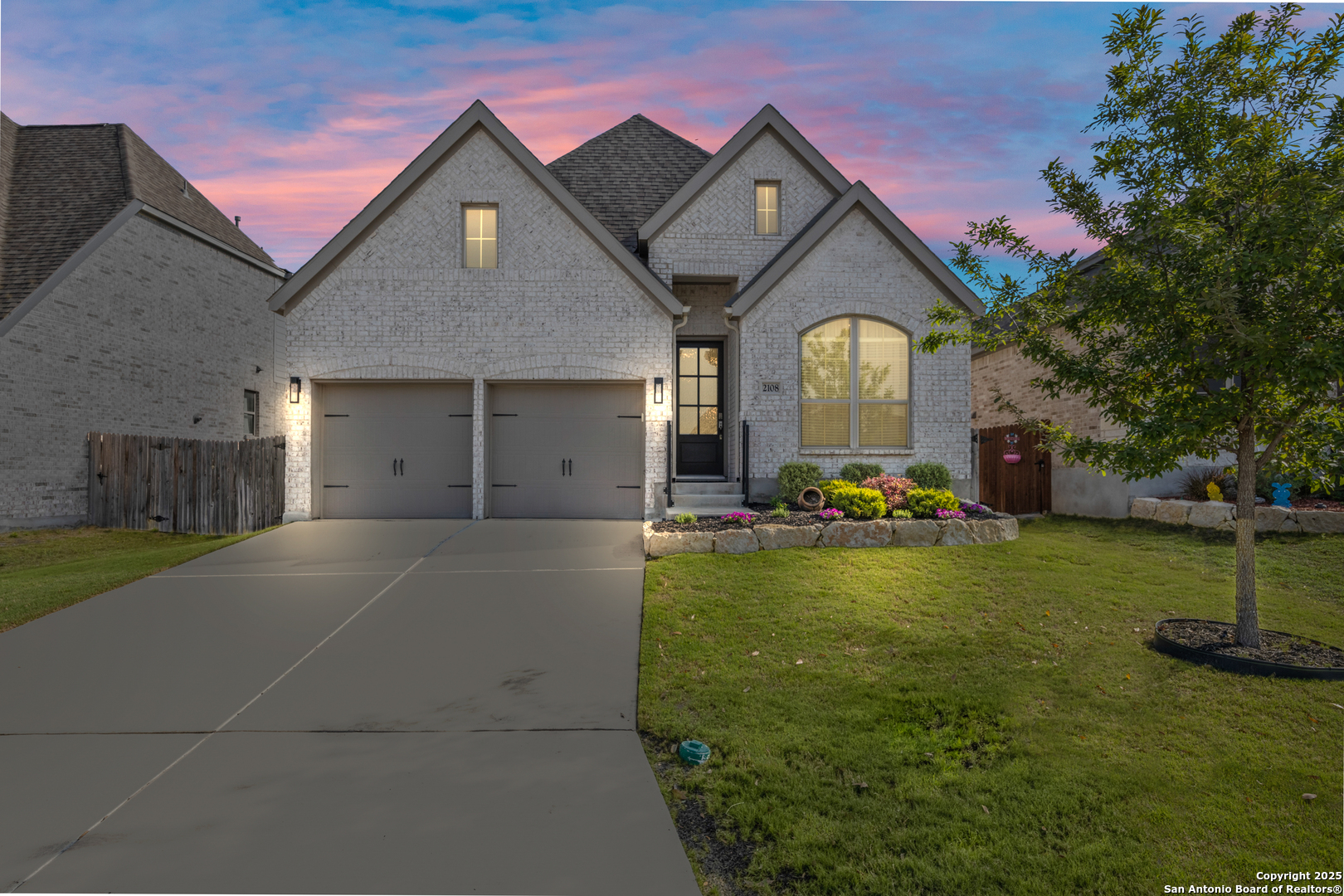 2108 Calate Ridge San Antonio, TX 78253 - Photo 2 of 25 a front view of house with yard and green space