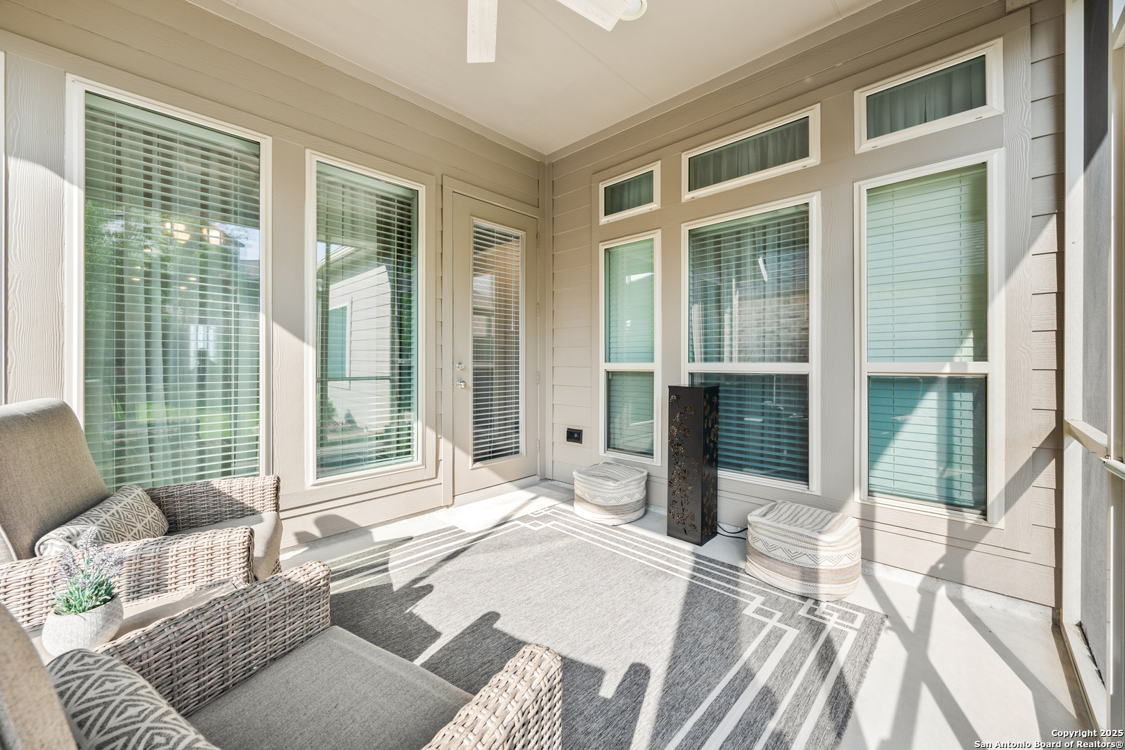 2108 Calate Ridge San Antonio, TX 78253 - Photo 21 of 25 a bedroom with a bed and glass door