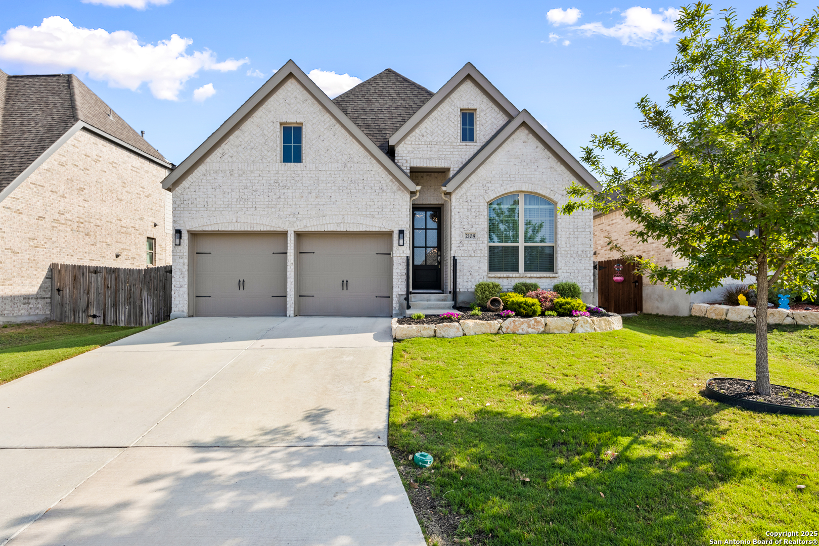 2108 Calate Ridge San Antonio, TX 78253 - Photo 25 of 25 a view of a house with backyard and a tree