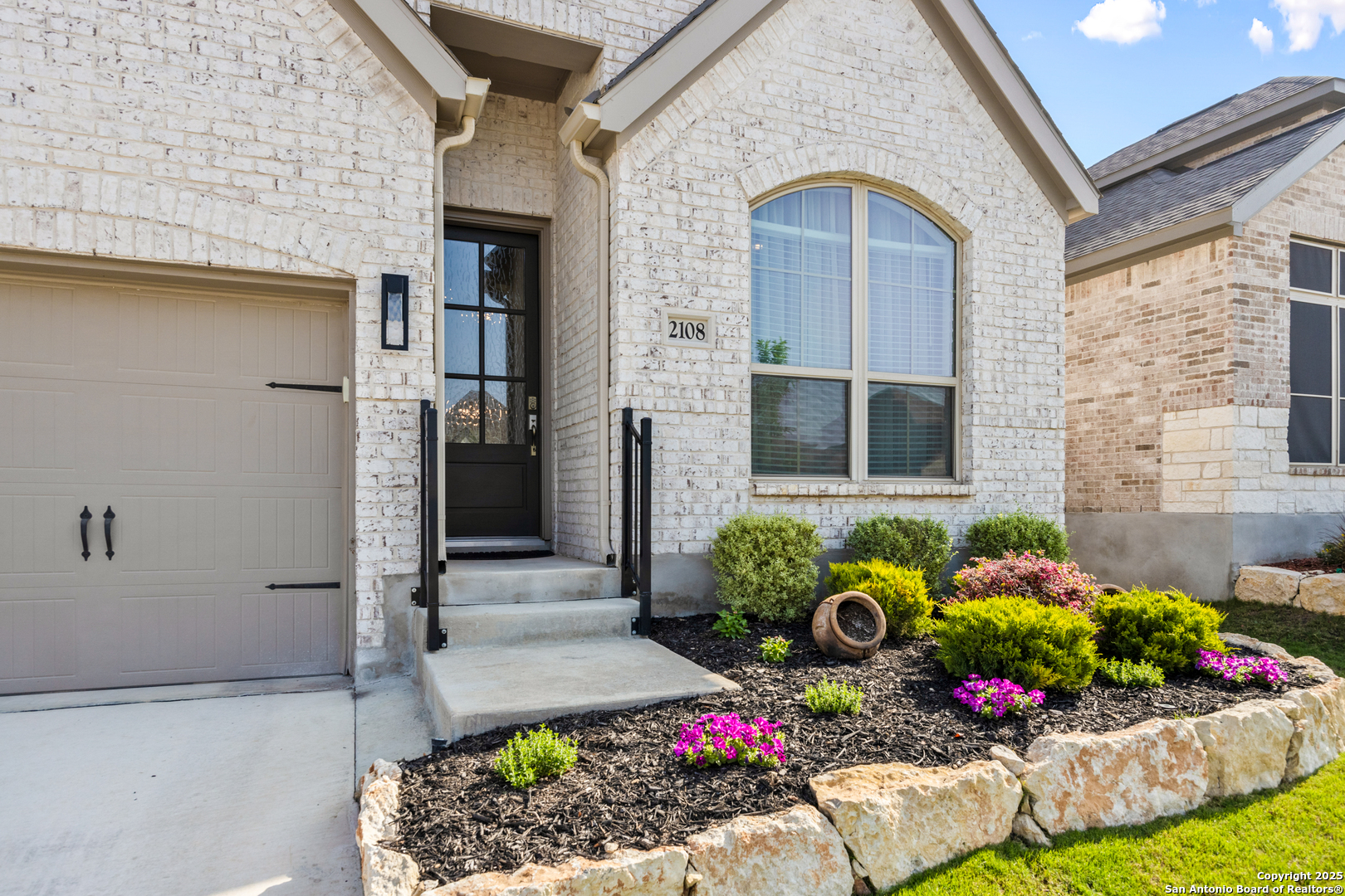 2108 Calate Ridge San Antonio, TX 78253 - Photo 3 of 25 a front view of a house with a garden