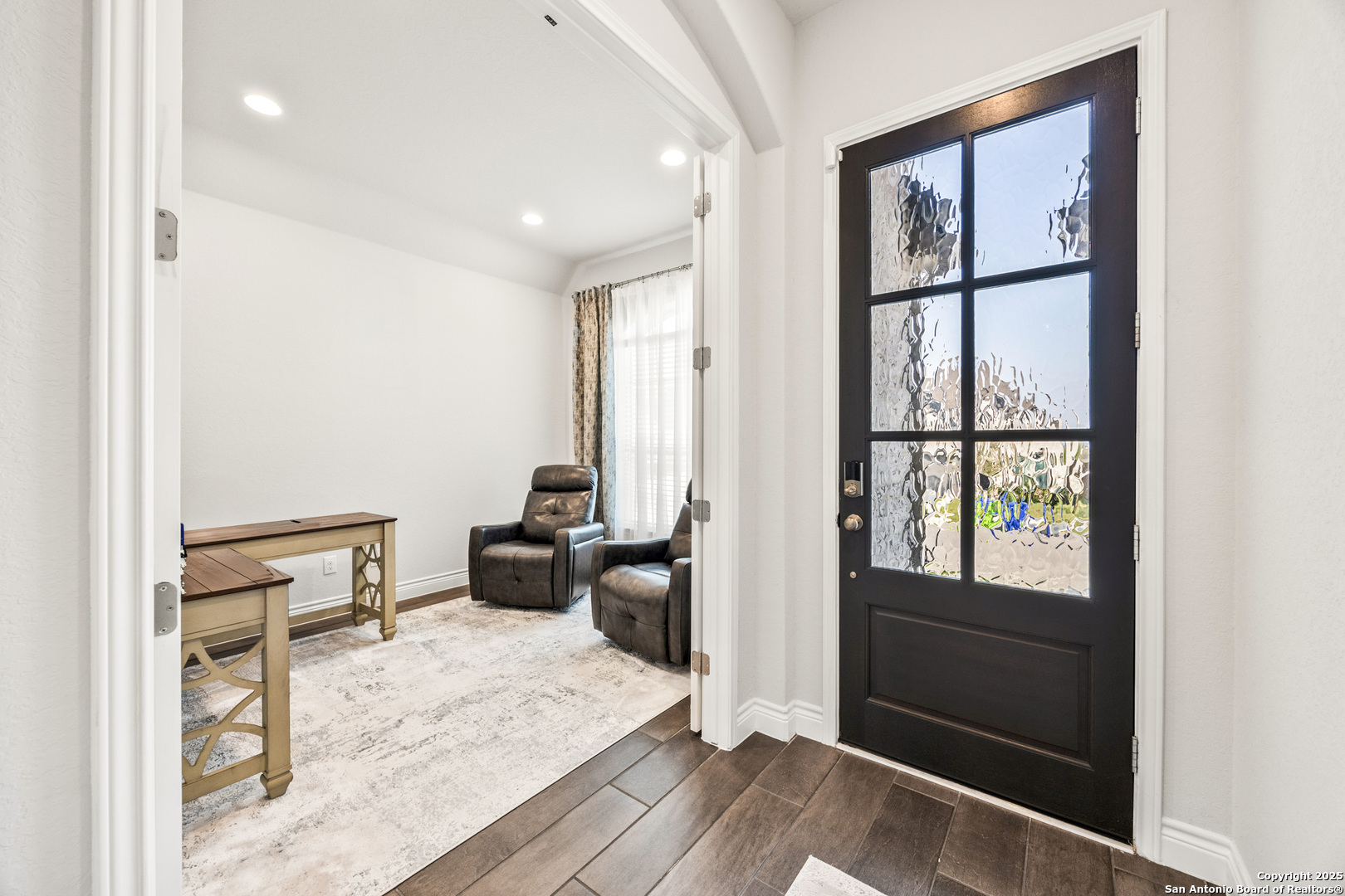 2108 Calate Ridge San Antonio, TX 78253 - Photo 6 of 25 a room with a bed a couch and a window