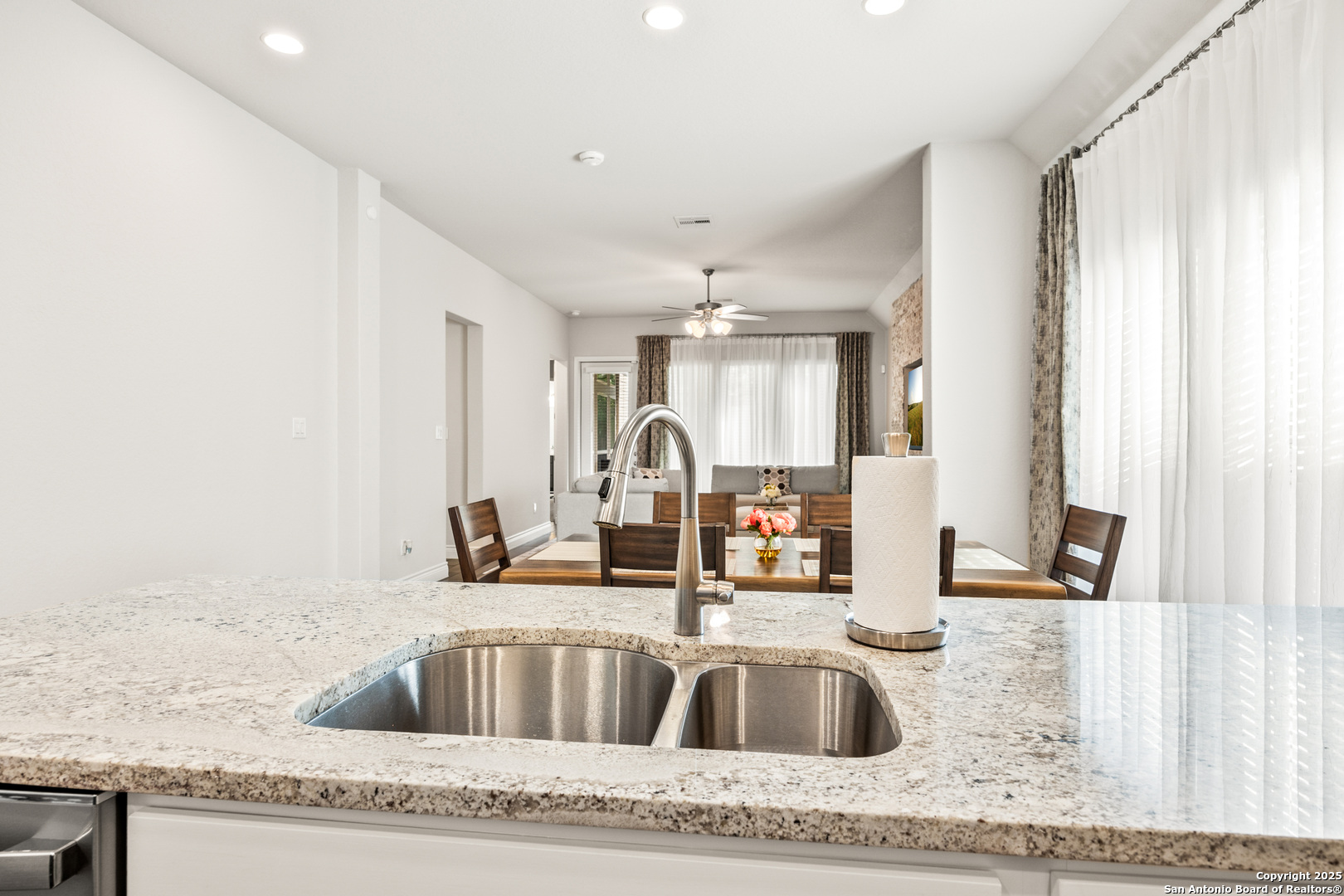 2108 Calate Ridge San Antonio, TX 78253 - Photo 9 of 25 a kitchen with granite countertop a sink and a granite top