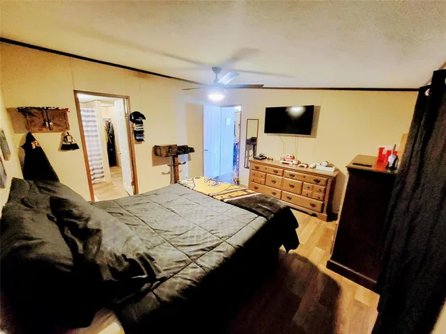 a bathroom with a toilet a sink and a mirror