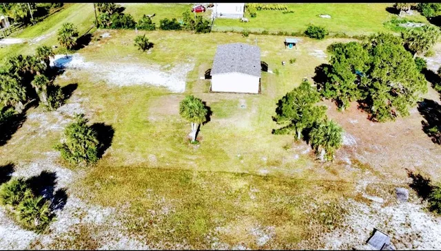a view of a garden with a bench