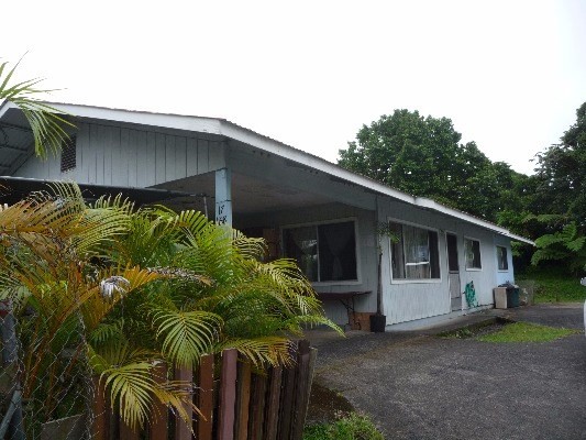 17-1158 Volcano Road Mountain View, HI 96771 - Photo 2 of 12 a backyard of a house with lots of green space