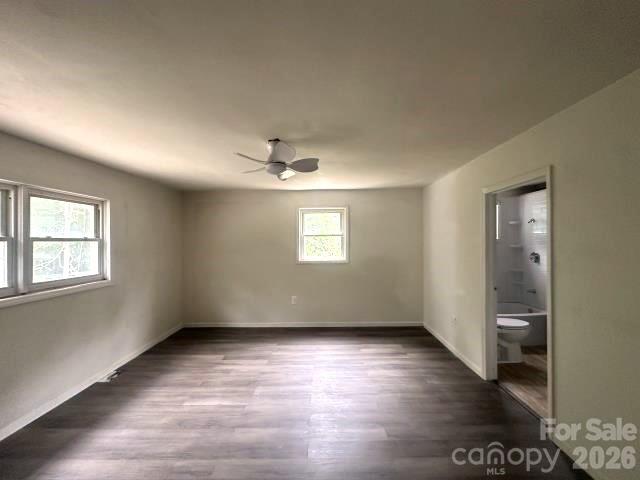 111 Dye Street Chester, SC 29706 - Photo 2 of 12 wooden floor in an empty room with a window
