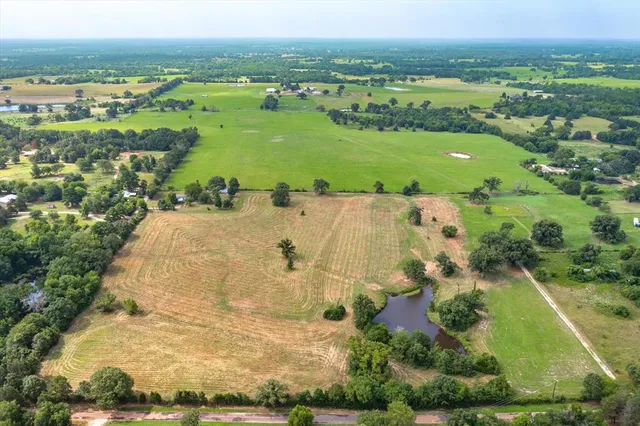 a view of a lake with a city