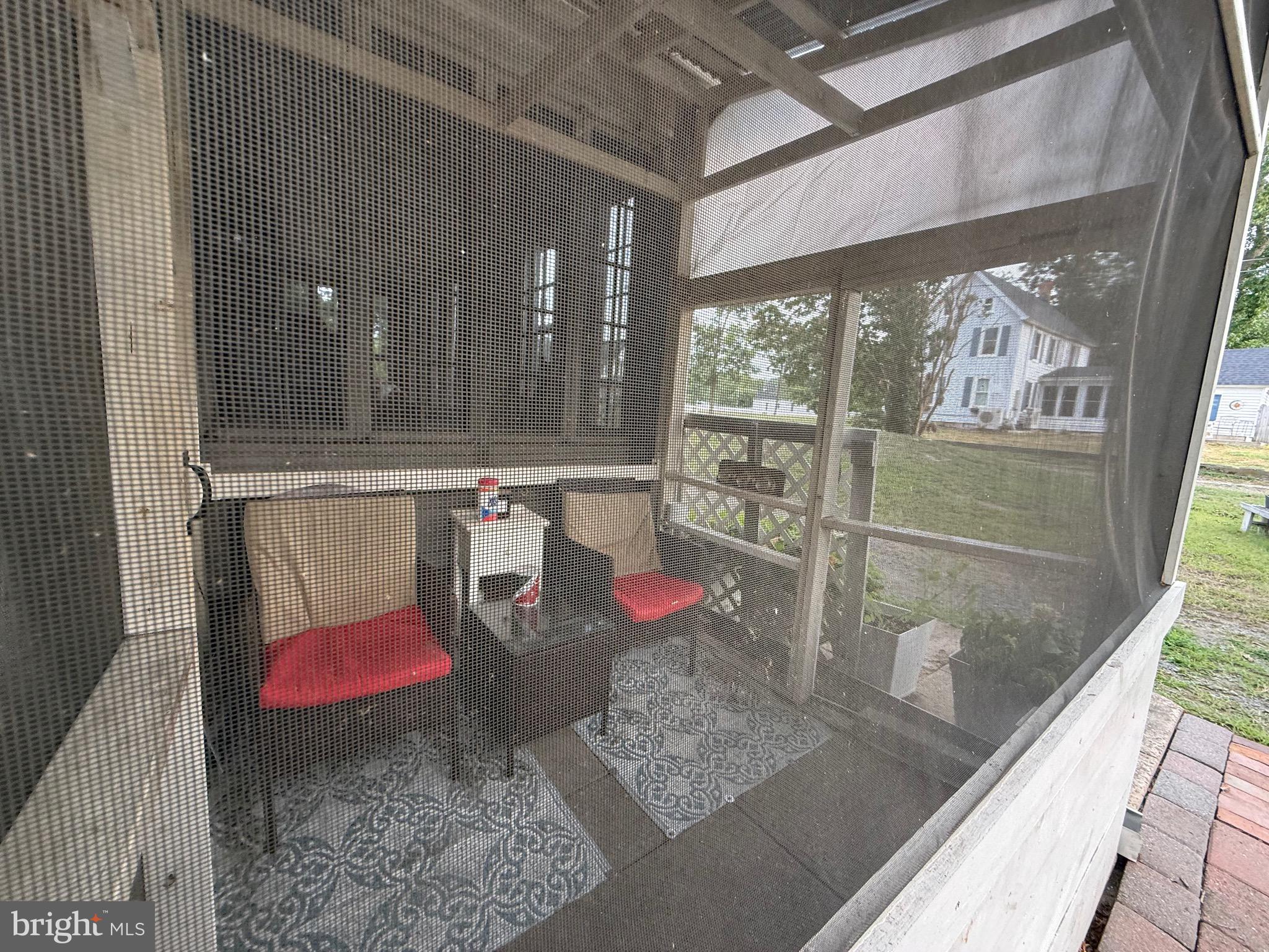 20502 Nanticoke Road Nanticoke, MD 21840 - Photo 55 of 68 Attached Screen patio for sheltered river views