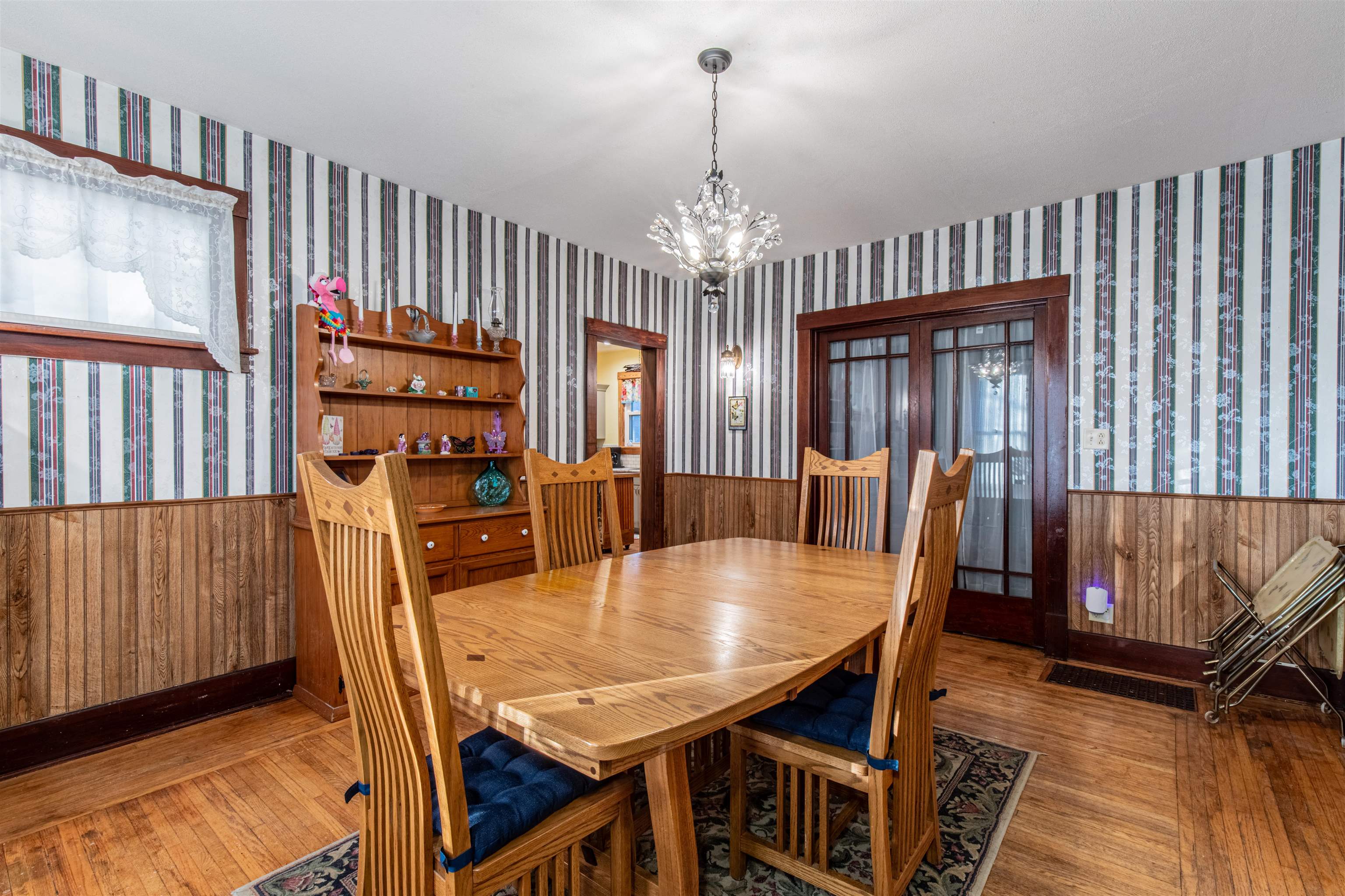 72 North Main Street La Moille, IL 61330 - Photo 11 of 31 a view of a dining room with furniture and a chandelier