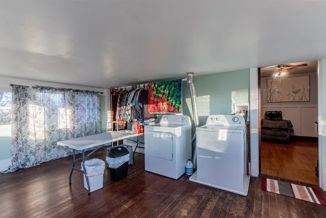 a room with furniture and wooden floor