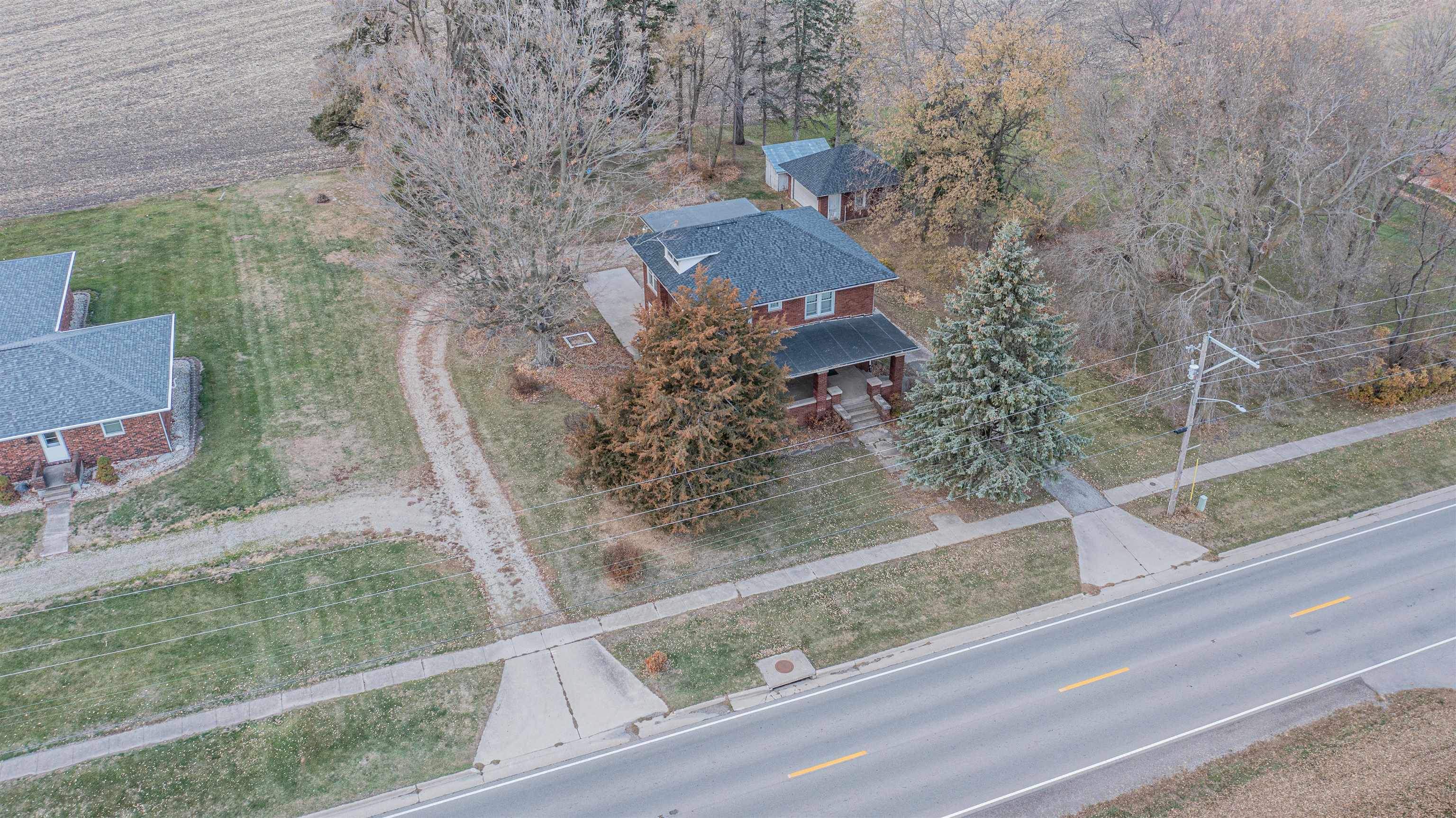 72 North Main Street La Moille, IL 61330 - Photo 27 of 31 an aerial view of a house with a yard