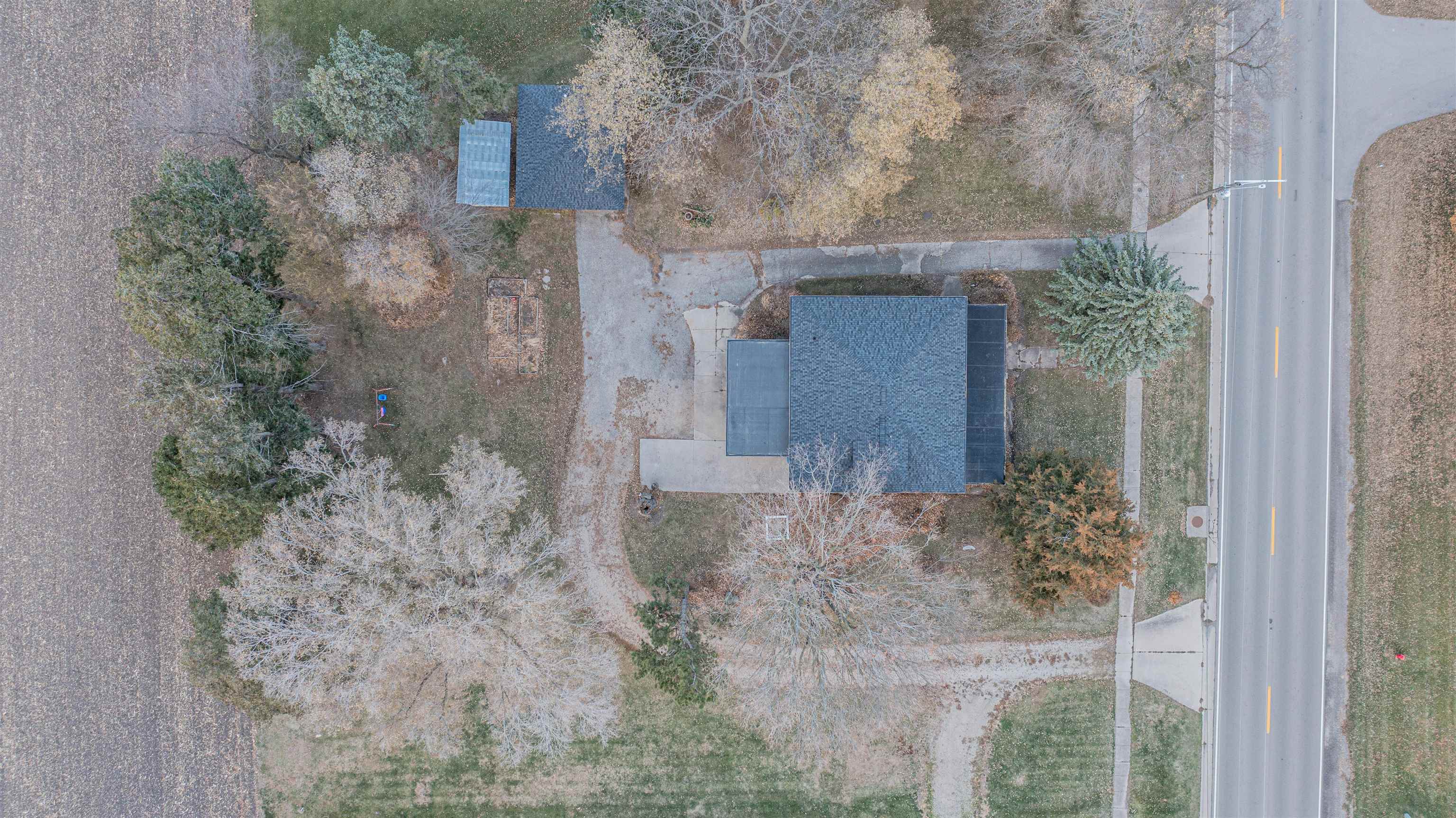 72 North Main Street La Moille, IL 61330 - Photo 28 of 31 a brick building with a yard