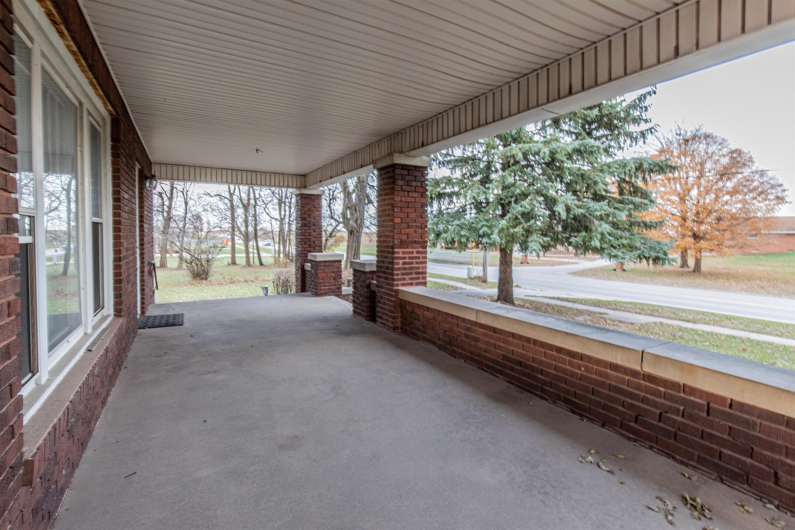 72 North Main Street La Moille, IL 61330 - Photo 3 of 31 a view of a room with large windows