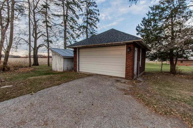a small white house with a outdoor space