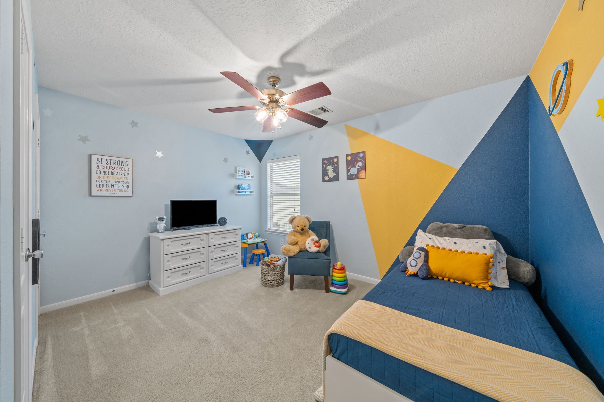 2903 Valiant Scene Court Houston, TX 77038 - Photo 7 of 19 a bedroom with furniture and a window