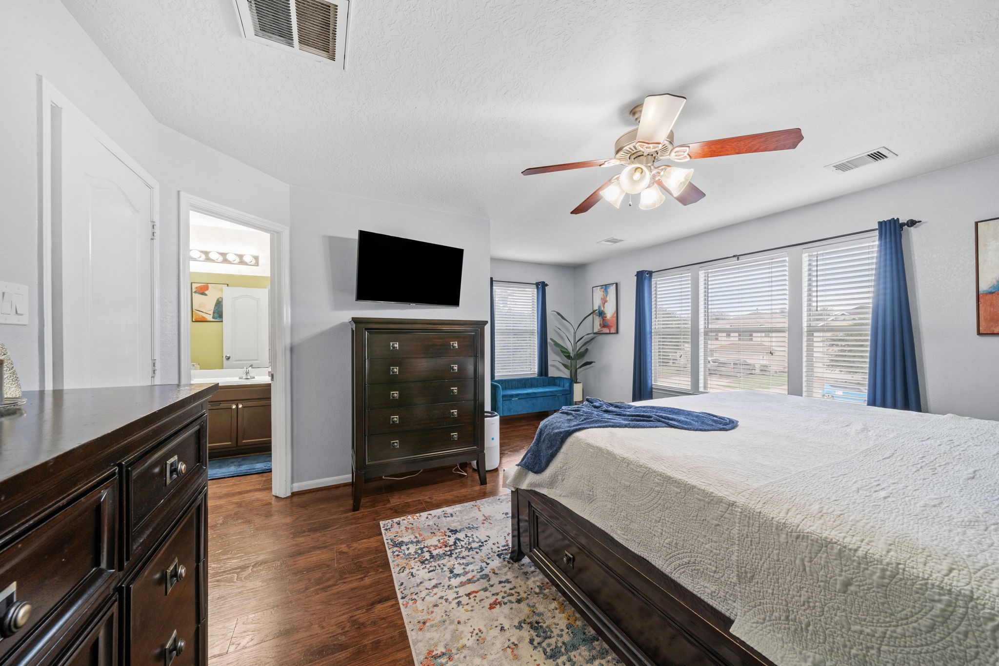 2903 Valiant Scene Court Houston, TX 77038 - Photo 9 of 19 a bedroom with a bed and a flat screen tv