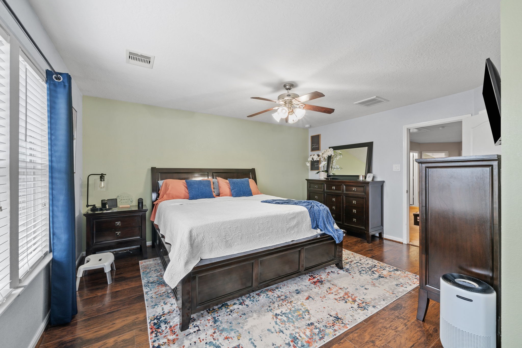 2903 Valiant Scene Court Houston, TX 77038 - Photo 10 of 19 a bed room with a bed and a television