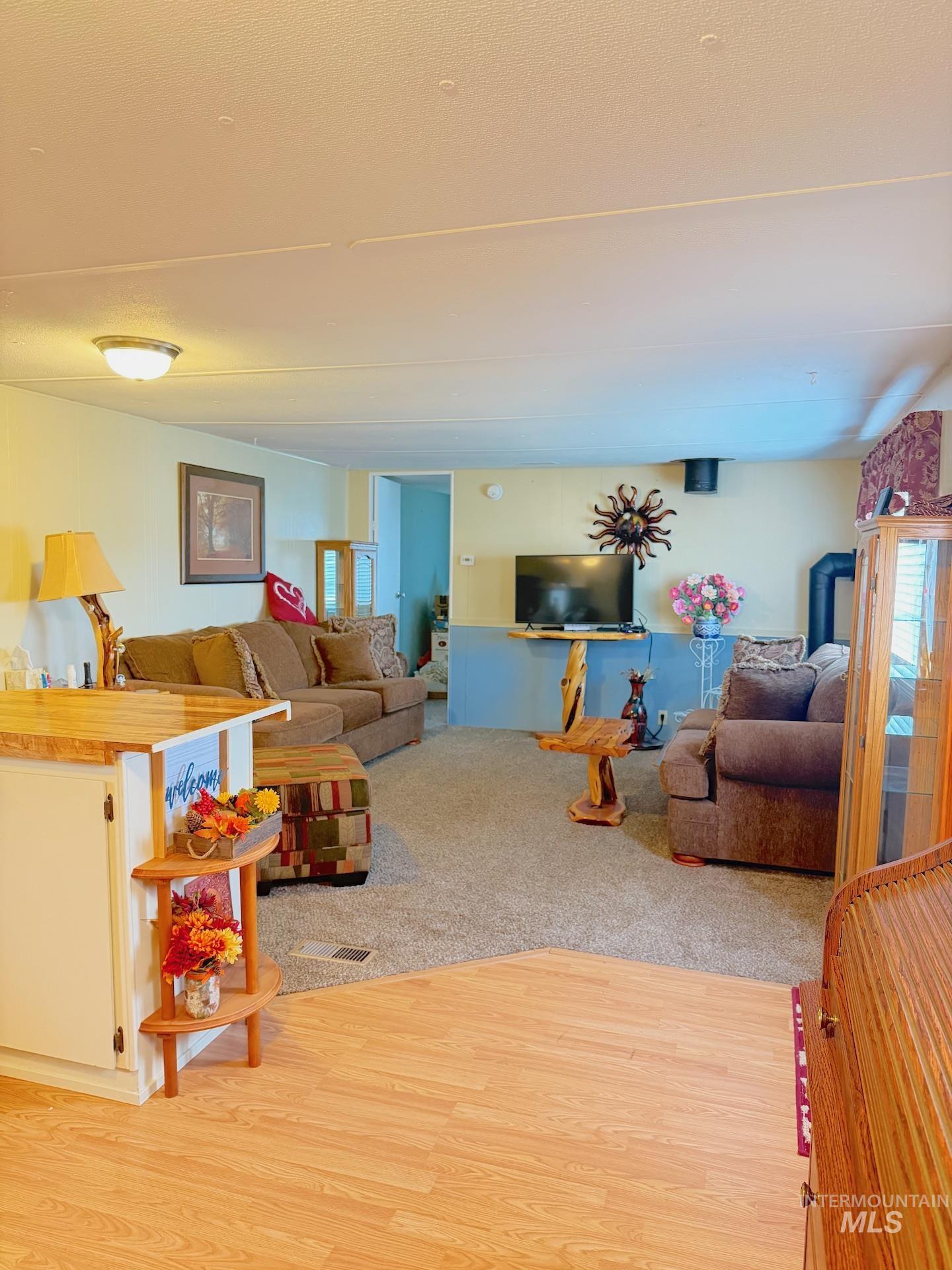 4325 Lenville Road, Unit 44 Moscow, ID 83843 - Photo 4 of 20 Living room featuring light wood-style flooring and healthy amount of natural light