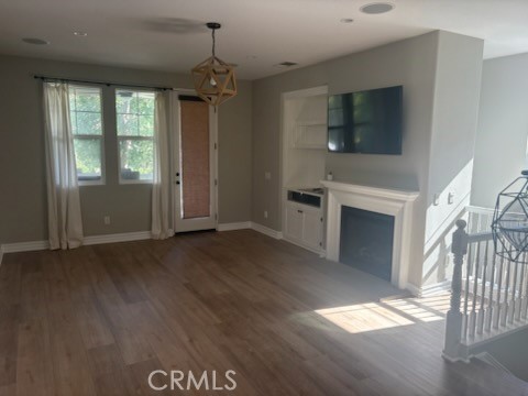 41 Ethereal Ladera Ranch, CA 92694 - Photo 4 of 9 a view of a livingroom with wooden floor and a ceiling fan