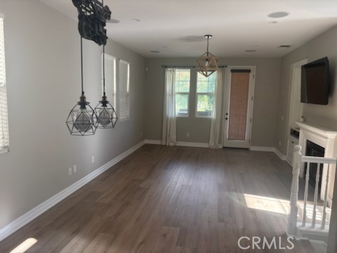 41 Ethereal Ladera Ranch, CA 92694 - Photo 5 of 9 wooden floor in an empty room with a window
