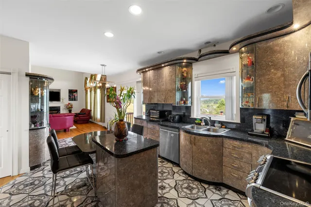 a room with lots of wooden furniture and glass windows
